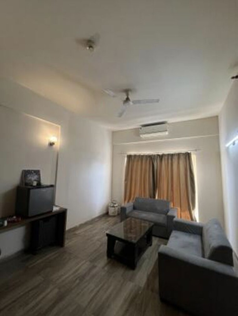 Living Room, paramount-golf-foreste-apartments Studio 725 Sq.Ft. Apartment In Zeta I Greater Noida Greater Noida 10724999