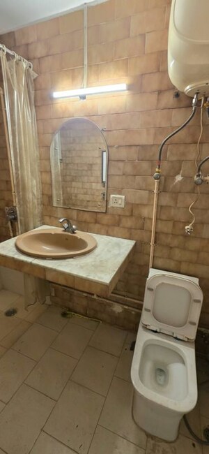 Bathroom in 2 BHK Builder Floor at Kalkaji – for Rent