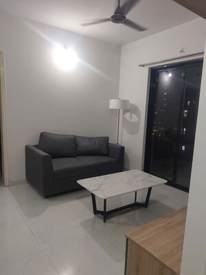 Living Room in 1 BHK Apartment at Runwal Gardens, Dombivli East – for Rent