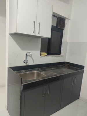 Kitchen in 1 BHK Apartment at Runwal Gardens, Dombivli East – for Rent