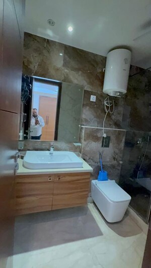 Bathroom in 3 BHK Builder Floor at Nehru Enclave – for Rent