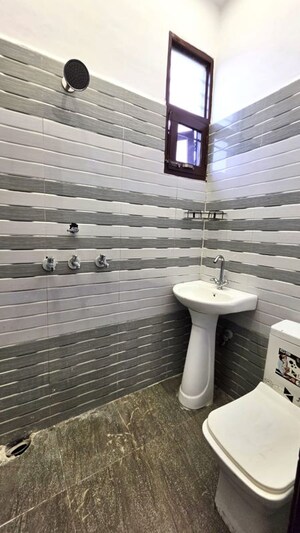 Bathroom in 2 BHK Apartment at Dhakoli – for Sale