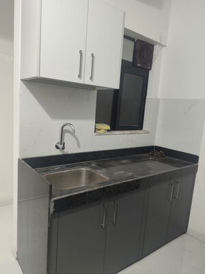Kitchen in 1 BHK Apartment at Runwal Gardens, Dombivli East – for Rent