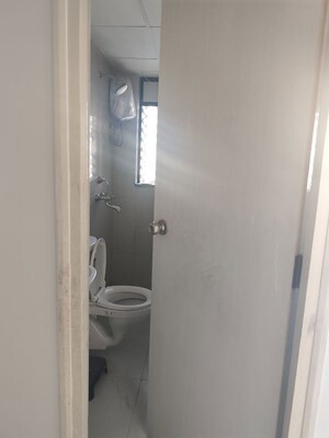 Bathroom in 1 BHK Apartment at Runwal Gardens, Dombivli East – for Sale