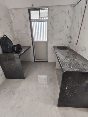 Kitchen in 2 BHK Apartment at Shreeji Plaza, Malad West – for Rent