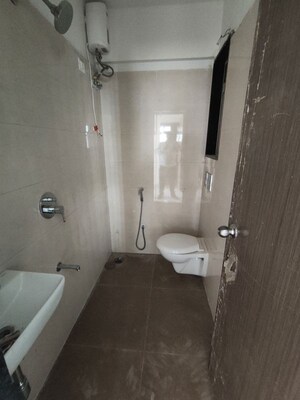Bathroom in 2 BHK Apartment at Shreeji Plaza, Malad West – for Rent