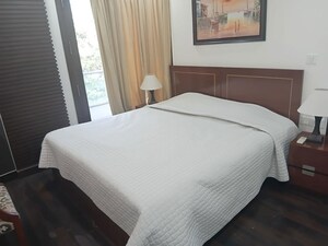 Bedroom in 3 BHK Builder Floor at Defence Colony – for Rent