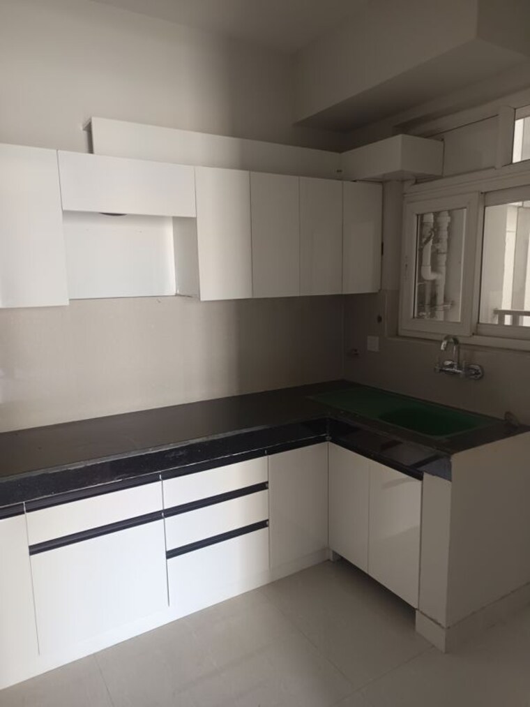 Kitchen, eldeco-live-by-the-greens 3 Bedroom 1404 Sq.Ft. Apartment In Sector 150 Noida 10725359