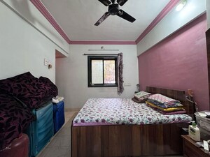 Bedroom in 2 BHK Apartment at Seema CHS Vasai, Vasai West – for Rent