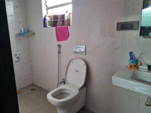 Bathroom in 2 BHK Apartment at Karan Gharonda, Wadgaon Sheri – for Rent