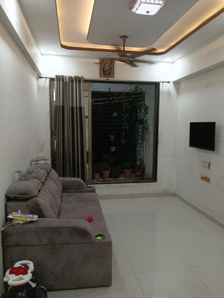 Living Room, yashvasin-chs-ltd 2 Bedroom 750 Sq.Ft. Apartment In Kharghar Navi Mumbai 10725499