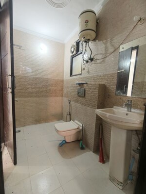 Bathroom in 3 BHK Builder Floor at Chattarpur – for Rent