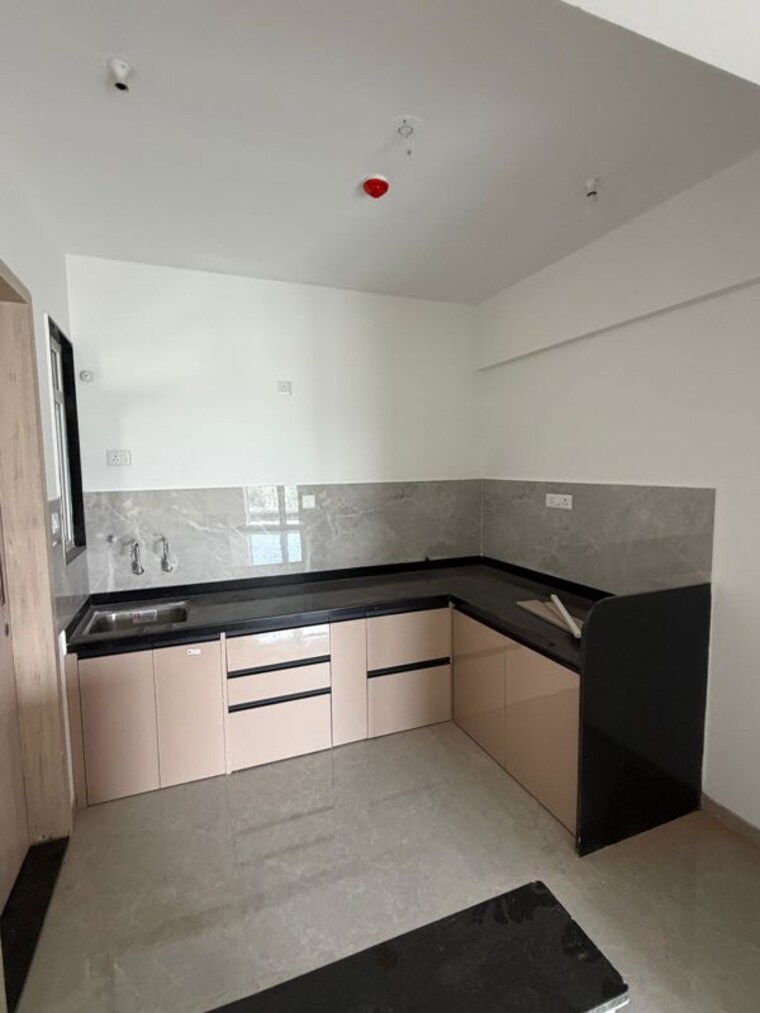 Kitchen, zen-elite 2 Bedroom 836 Sq.Ft. Apartment In Kharadi Pune 10725550