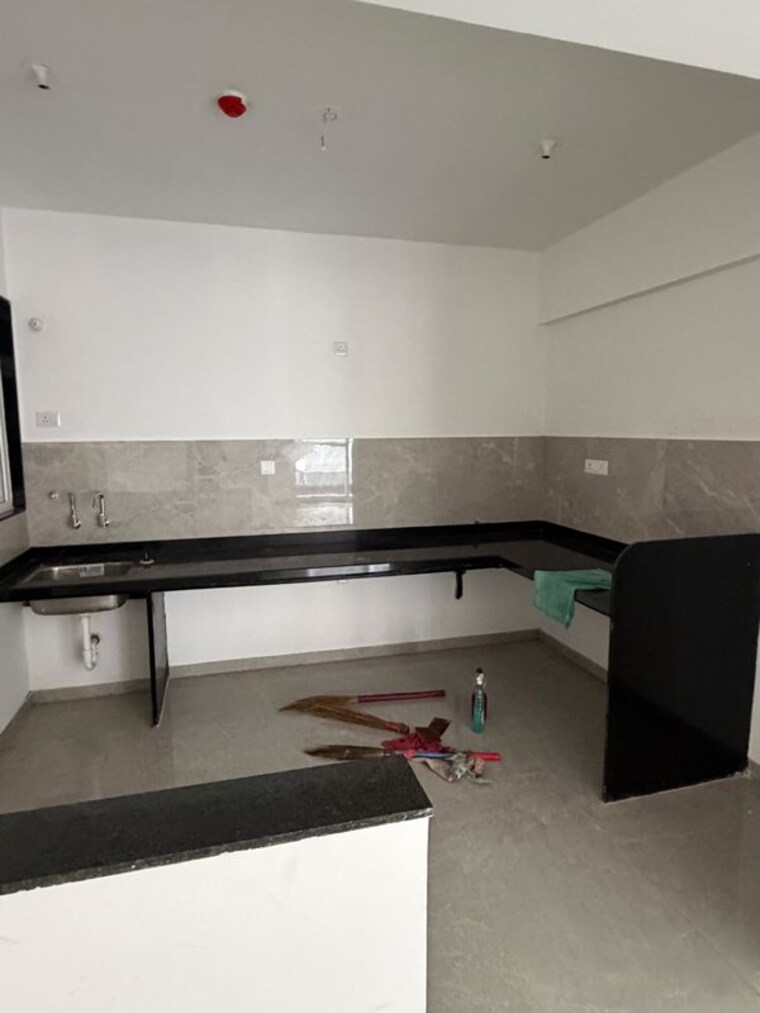 Kitchen, zen-elite 3 Bedroom 1070 Sq.Ft. Apartment In Kharadi Pune 10725572