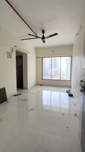 Living Room in 1 BHK Apartment at Royal Royal Nest, Malad West – for Rent