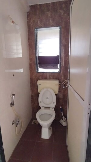 Bathroom in 1 BHK Apartment at Royal Royal Nest, Malad West – for Rent