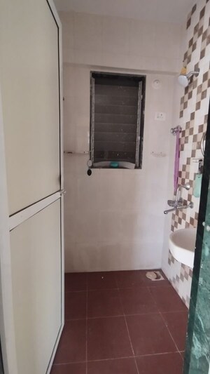 Bathroom in 1 BHK Apartment at Royal Royal Nest, Malad West – for Rent