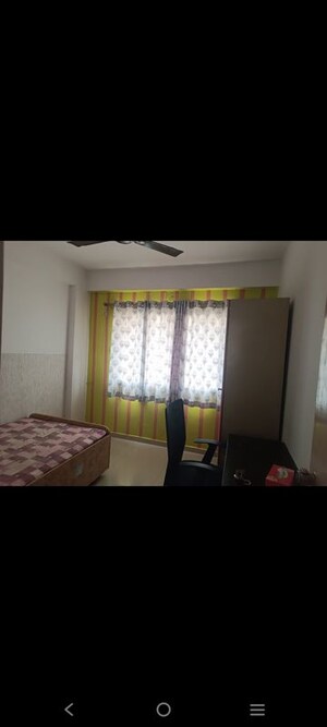 Bedroom in 2 BHK Apartment at Sunbeach Dev Residency, Sabarmati – for Rent