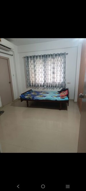 Bedroom in 2 BHK Apartment at Sunbeach Dev Residency, Sabarmati – for Rent