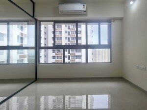 Living Room in 2 BHK Apartment at Piramal Vaikunth, Balkum Pada – for Rent