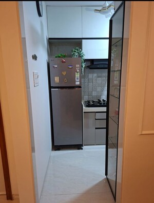 Kitchen in 2 BHK Apartment at MK Gracia, Amboli – for Rent