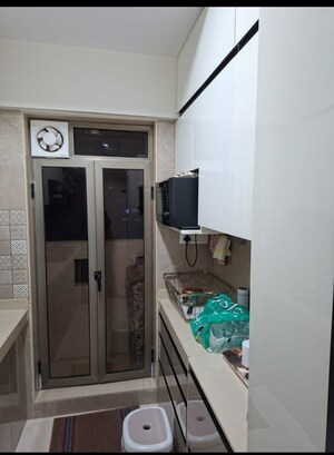 Kitchen in 2 BHK Apartment at MK Gracia, Amboli – for Rent