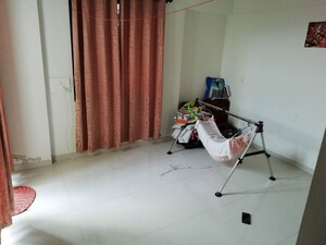 Room in 2 BHK Apartment at Rohan Rudra, Wagholi – for Sale