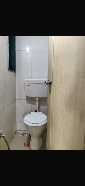 Bathroom in 1 BHK Apartment at Titanium Tower, Haware City – for Rent