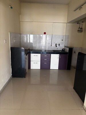 Kitchen in 2 BHK Apartment at Ayaan Society , Wagholi – for Sale