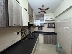 Kitchen in 2 BHK Apartment at Scarlet Seawood Heights, Nerul – for Rent