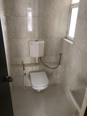 Bathroom in 1 BHK Apartment at Puranik Rumah Bali, Ghodbunder Road – for Rent