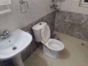 Bathroom in 2 BHK Apartment at Gardenia Golf City, Sector 75 – for Rent