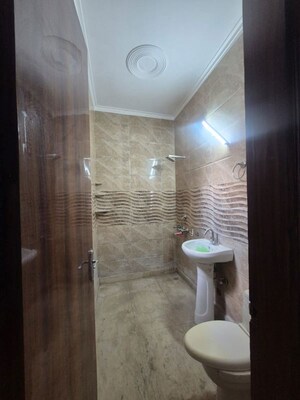 Bathroom in 4 BHK Builder Floor at Green Fields Colony – for Rent