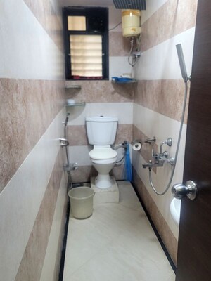 Bathroom in 2 BHK Apartment at Anik Court Apartment, Dadar West – for Rent