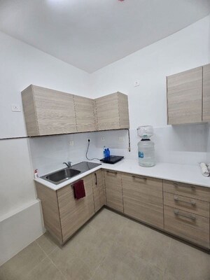 Kitchen in 1 RK Apartment at Bhartiya Nikoo Homes Phase 2, Thanisandra Main Road – for Rent
