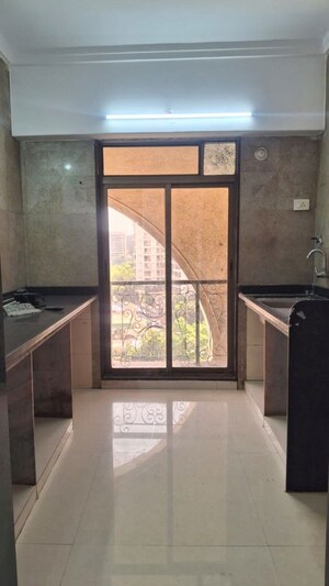 Kitchen in 2 BHK Apartment at Kaamdhenu Sai Pushpam, Ulwe – for Rent