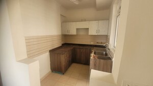 Kitchen in 3 BHK Apartment at Amrapali Silicon City, Sector 76 – for Sale