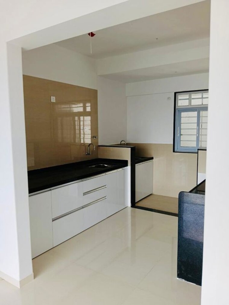 Kitchen, majestique-signature-tower-phase-2 2 Bedroom 863 Sq.Ft. Apartment In Balewadi Pune 10726556