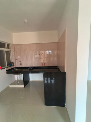 Kitchen in 2 BHK Apartment at Ganga Fernhill, Undri – for Rent