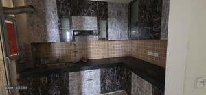 Kitchen in 2 BHK Apartment at Mahagun Mywoods, Sector 16c Greater Noida – for Sale