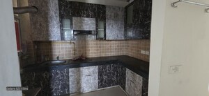 Kitchen in 2 BHK Apartment at Mahagun Mywoods, Sector 16c Greater Noida – for Sale