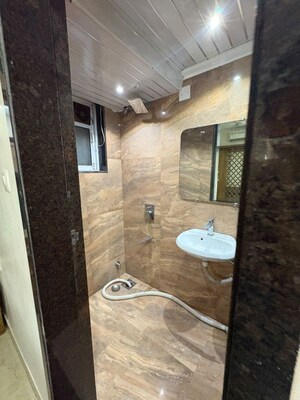 Bathroom in 2 BHK Apartment at Siddhi Highland Park, Kolshet Road – for Rent