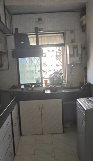 Kitchen in 2 BHK Apartment at Dheeraj Darshan, Jogeshwari East – for Rent