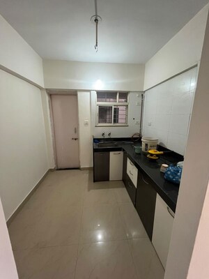 Kitchen in 2 BHK Apartment at Goel Sai Ganga, Undri – for Rent