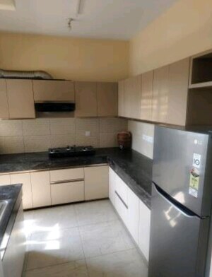Kitchen in 2 BHK Apartment at Experion Capital, Gomti Nagar – for Rent