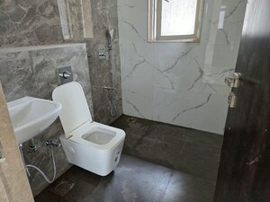 Bathroom in 2.5 BHK Apartment at Gundecha Symphony, Andheri West – for Sale