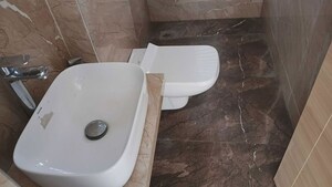 Bathroom in 2 BHK Apartment at Ruparel Iris, Matunga West – for Sale