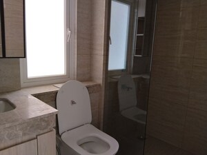 Bathroom in 3.5 BHK Builder Floor at DLF Gardencity Enclave, Sector 93 – for Sale