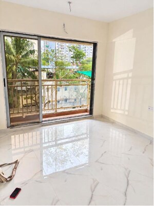 Living Room in 1 BHK Apartment at Ram Pushpanjali Residency, Owale – for Rent
