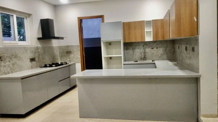 Kitchen, cynosure-jyothi-woods 5 Bedroom 3500 Sq.Ft. Villa In Aecs Layout Bangalore 10727097